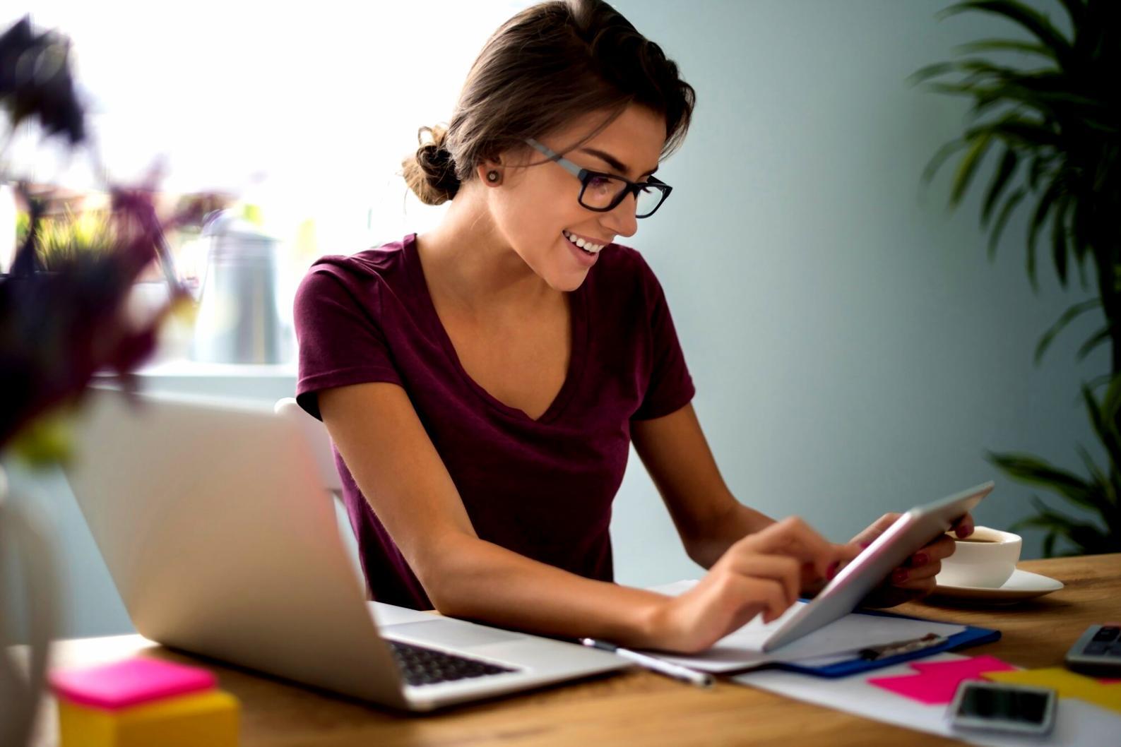 Student reviewing budgeting materials during workshop session